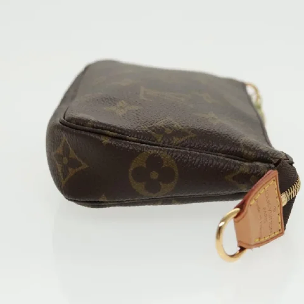 Louis Vuitton Vintage Pre-owned Canvas pouches Brown Dames