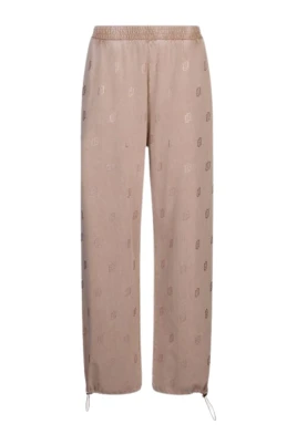 Jeans i tvättad jersey med strass