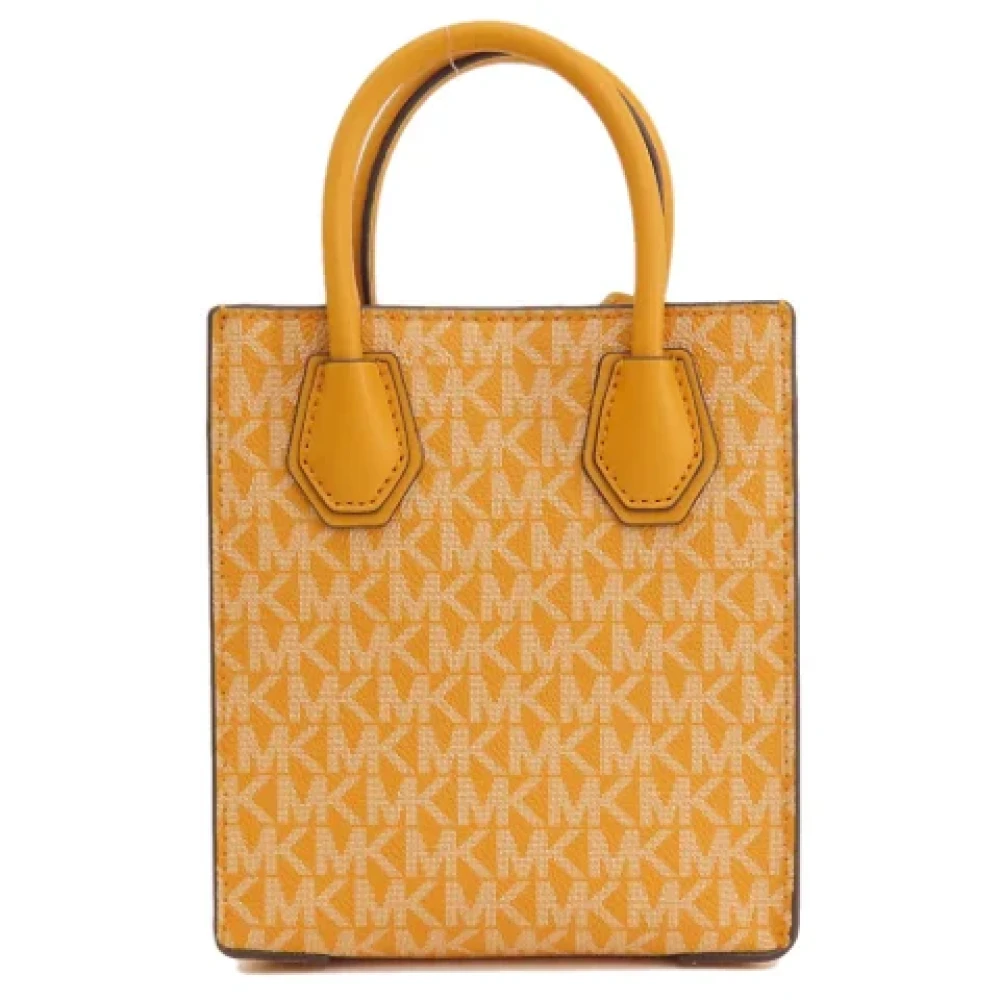Michael Kors Pre-owned Canvas handbags Yellow Dames