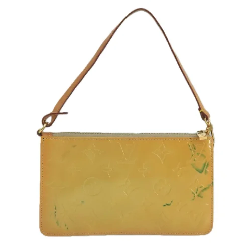 Louis Vuitton Vintage Pre-owned Leather pouches Beige Dames