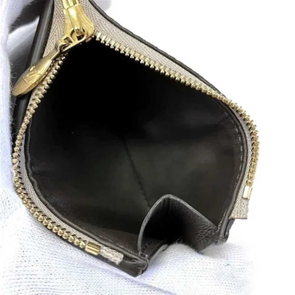 Louis Vuitton Vintage Pre-owned Leather wallets Beige Dames
