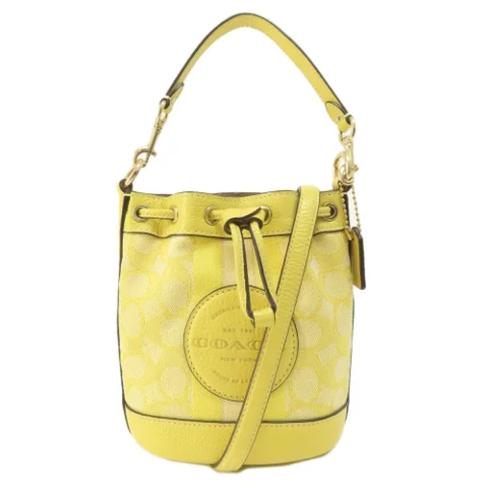 Coach Pre-owned Canvas handbags Yellow Dames