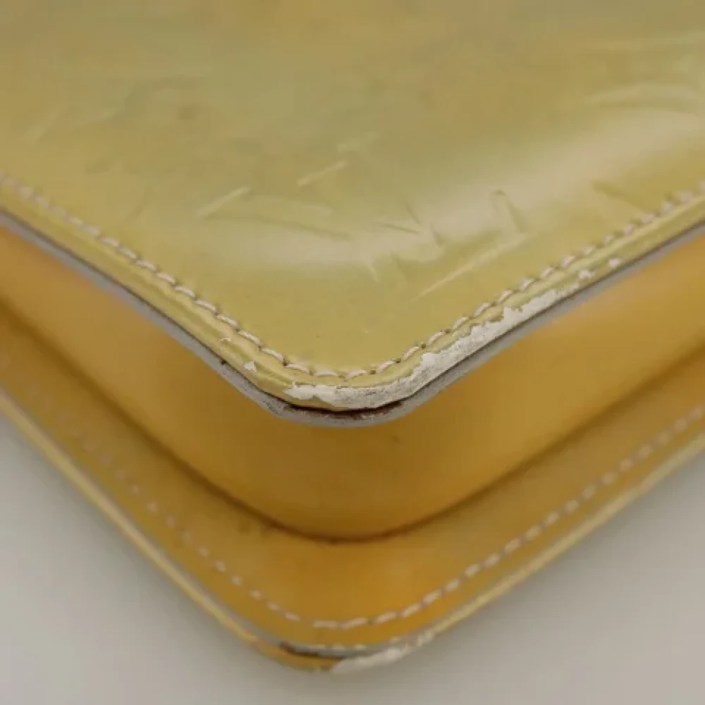 Louis Vuitton Vintage Pre-owned Leather pouches Beige Dames