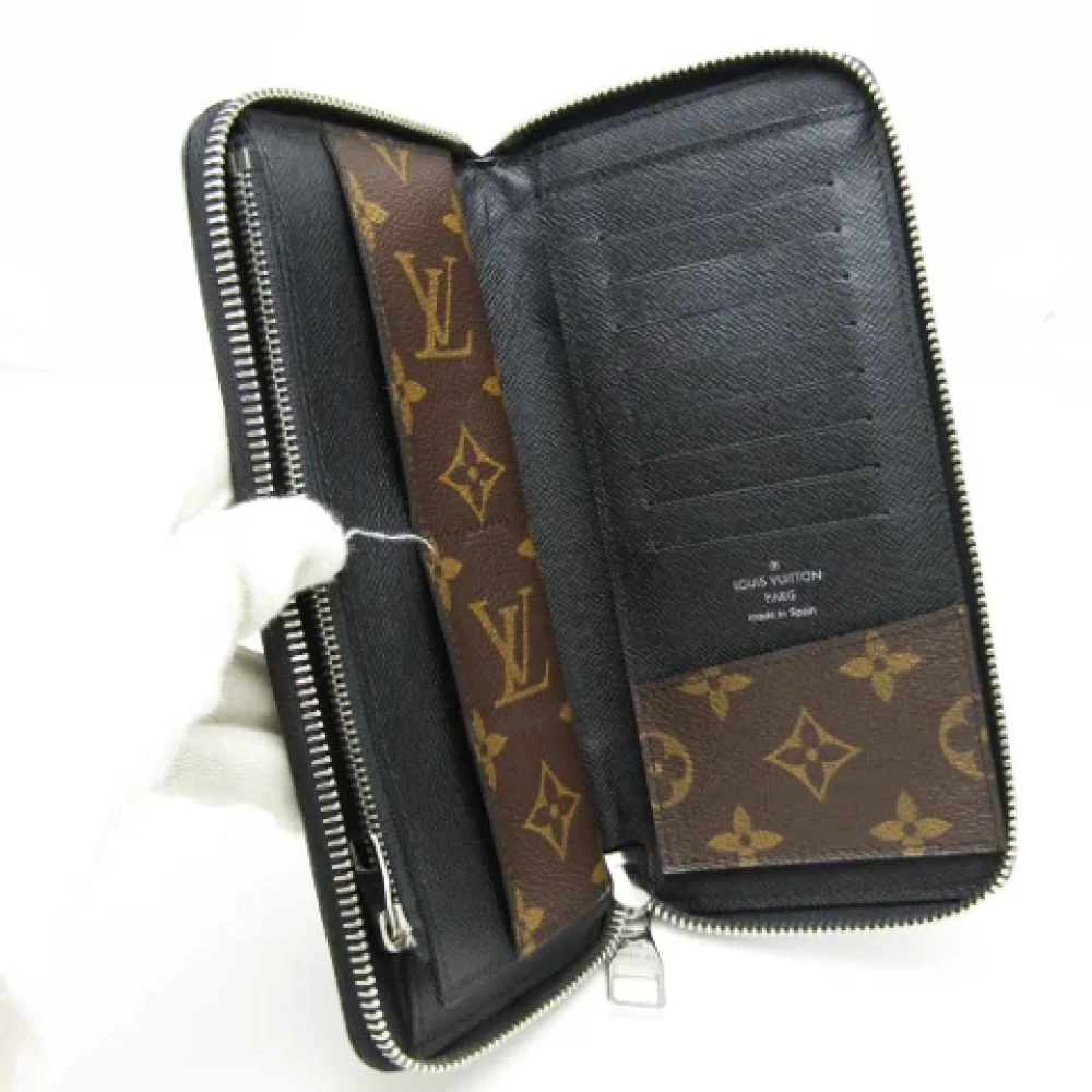 Louis Vuitton Vintage Pre-owned Canvas wallets Brown Heren