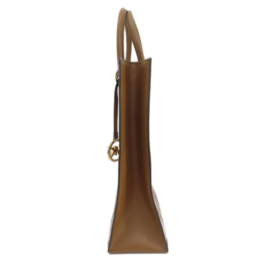 Michael Kors Pre-owned Plastic handbags Brown Dames