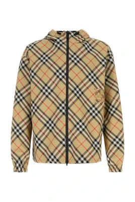 Broderad vändbar jacka i polyester
