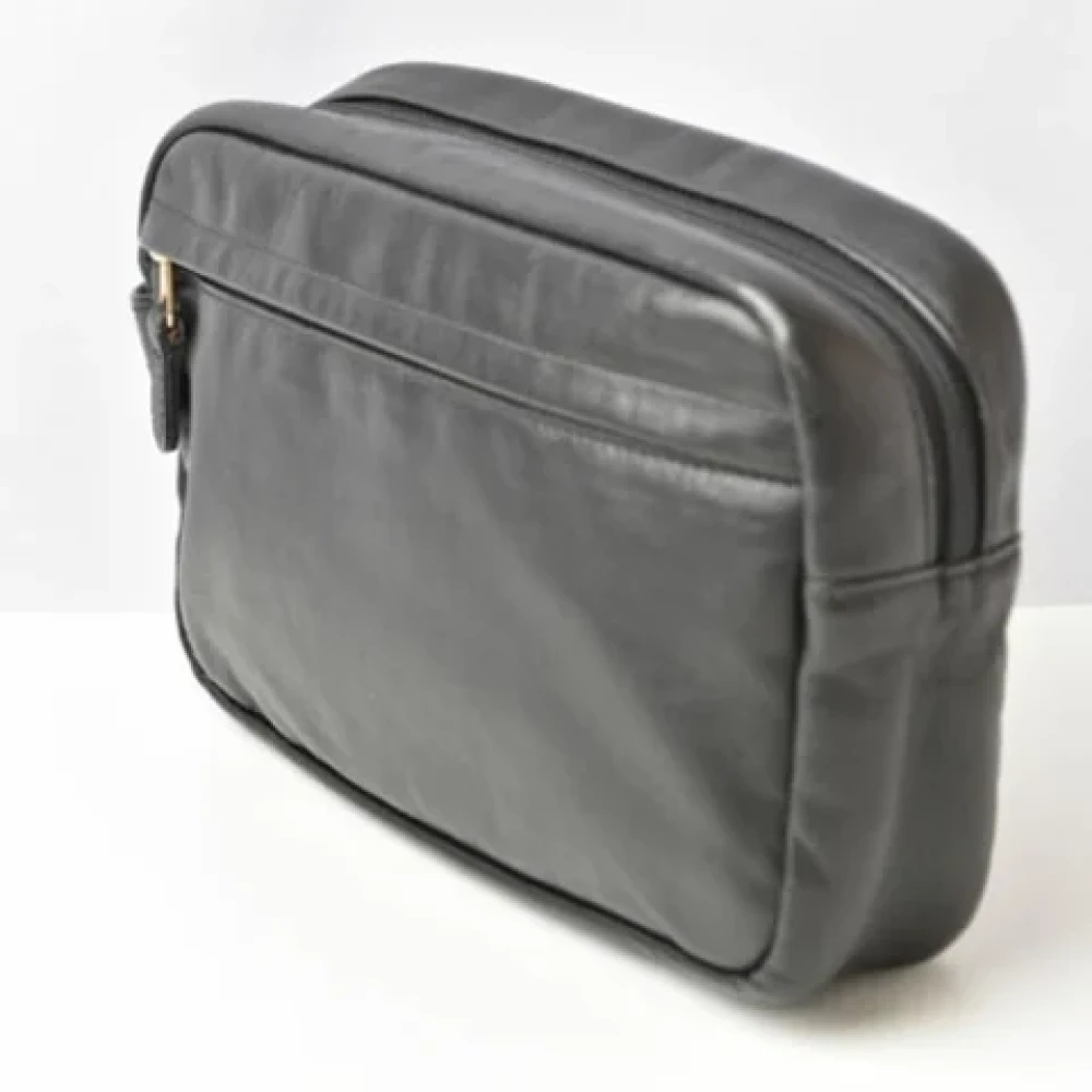 Coach Pre-owned Leather clutches Black Dames