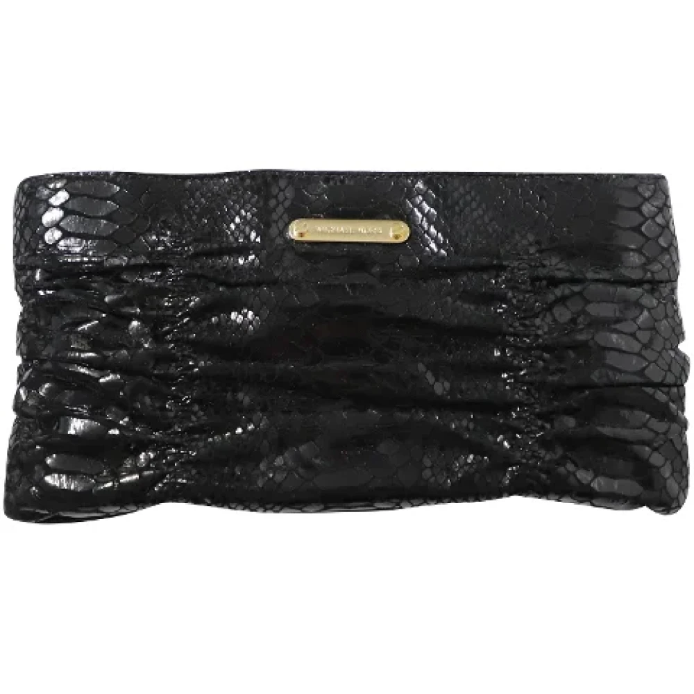 Michael Kors Pre-owned Leather clutches Black Dames