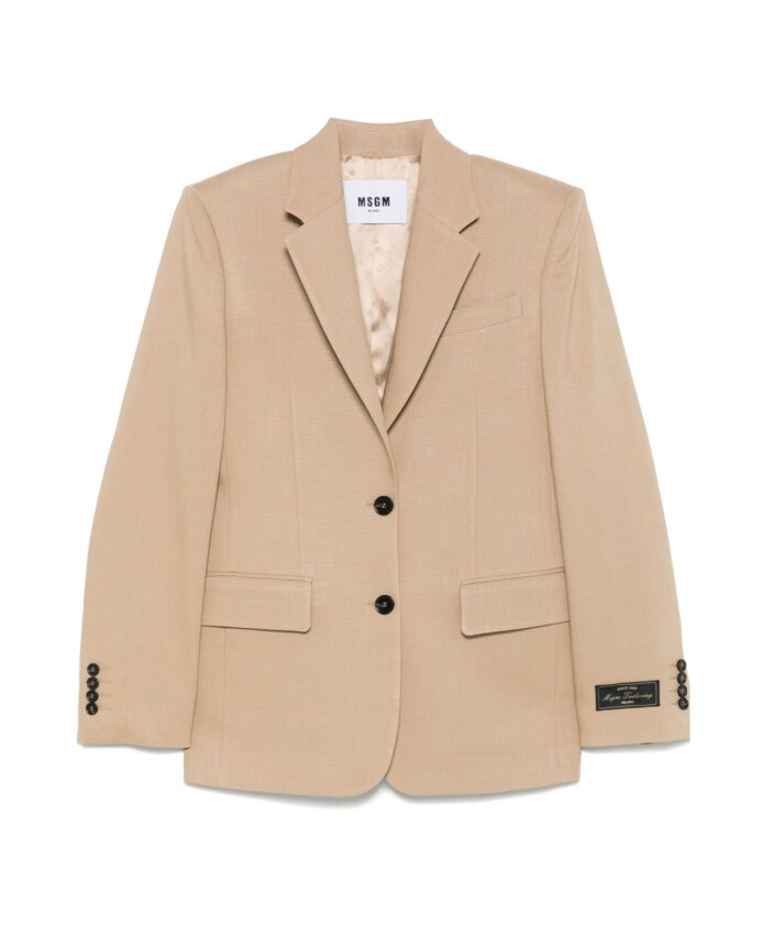 beige-jas-met-knoopsluiting-zakken