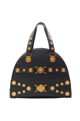 sac-a-main-elegant-avec-medaillons-et-poignees