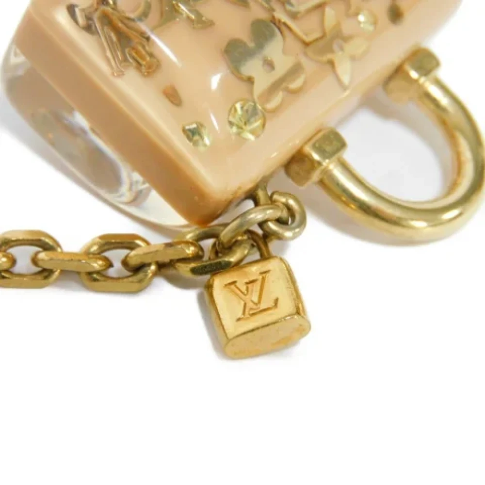 Louis Vuitton Vintage Pre-owned Metal key-holders Yellow Dames