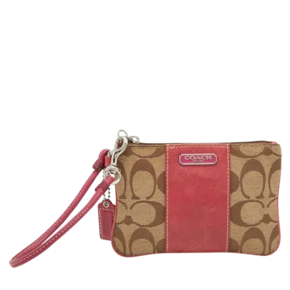 Coach Pre-owned Canvas clutches Beige Dames