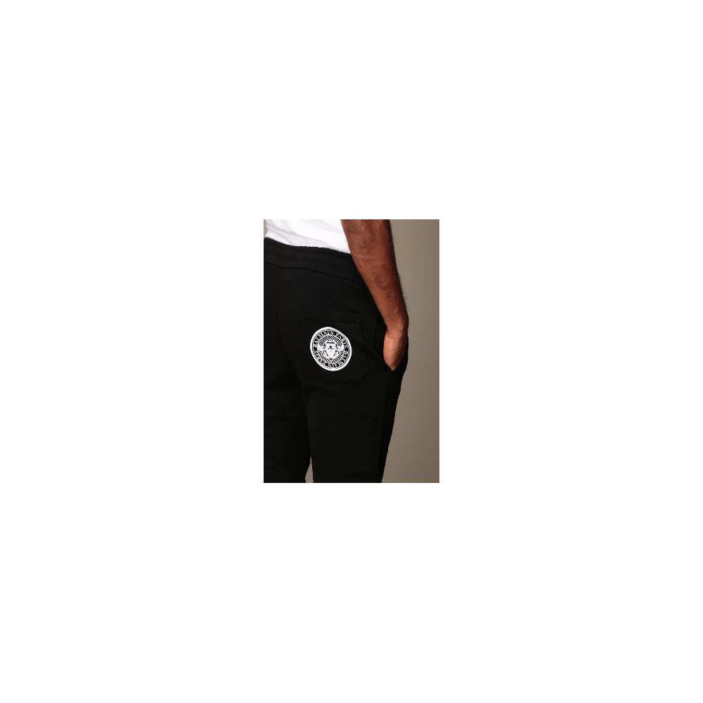 Balmain Zwarte katoenen broek met bedrukt logo en ritssluiting Black Heren