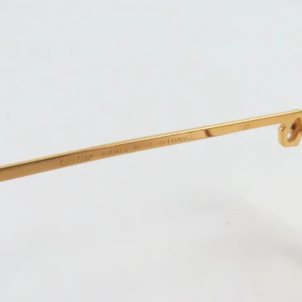 Cartier Vintage Pre-owned Metal sunglasses Yellow Heren