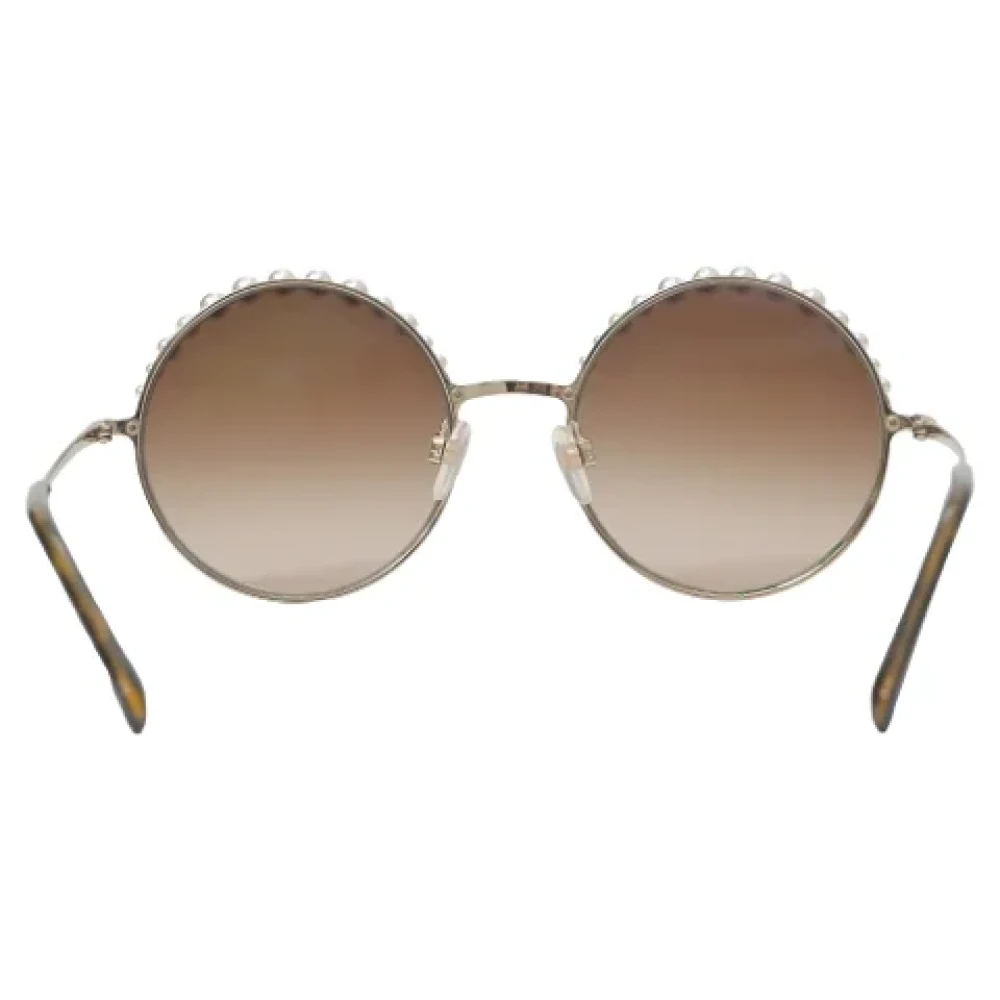 Chanel Vintage Pre-owned Metal sunglasses Yellow Dames