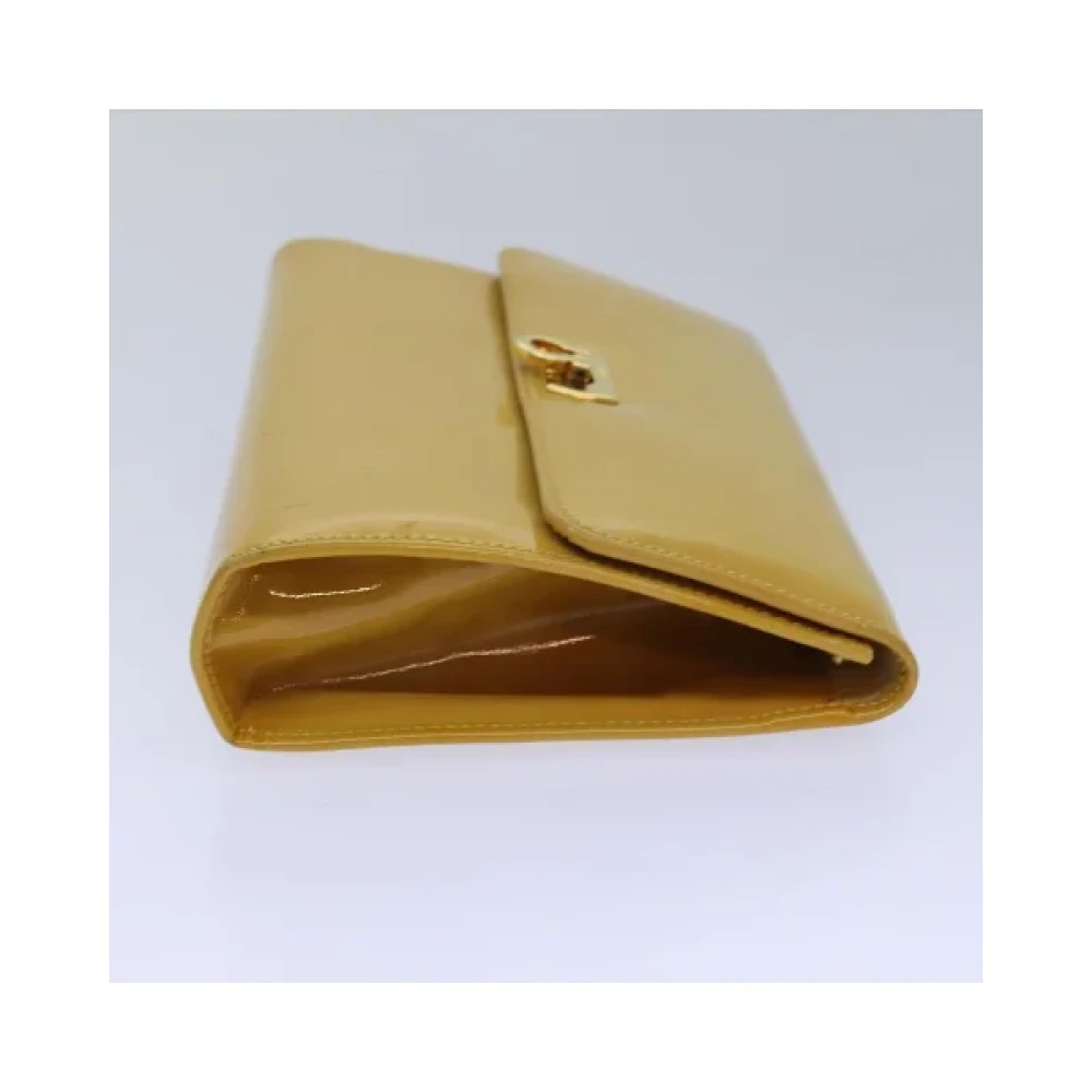Salvatore Ferragamo Pre-owned Fabric pouches Yellow Dames