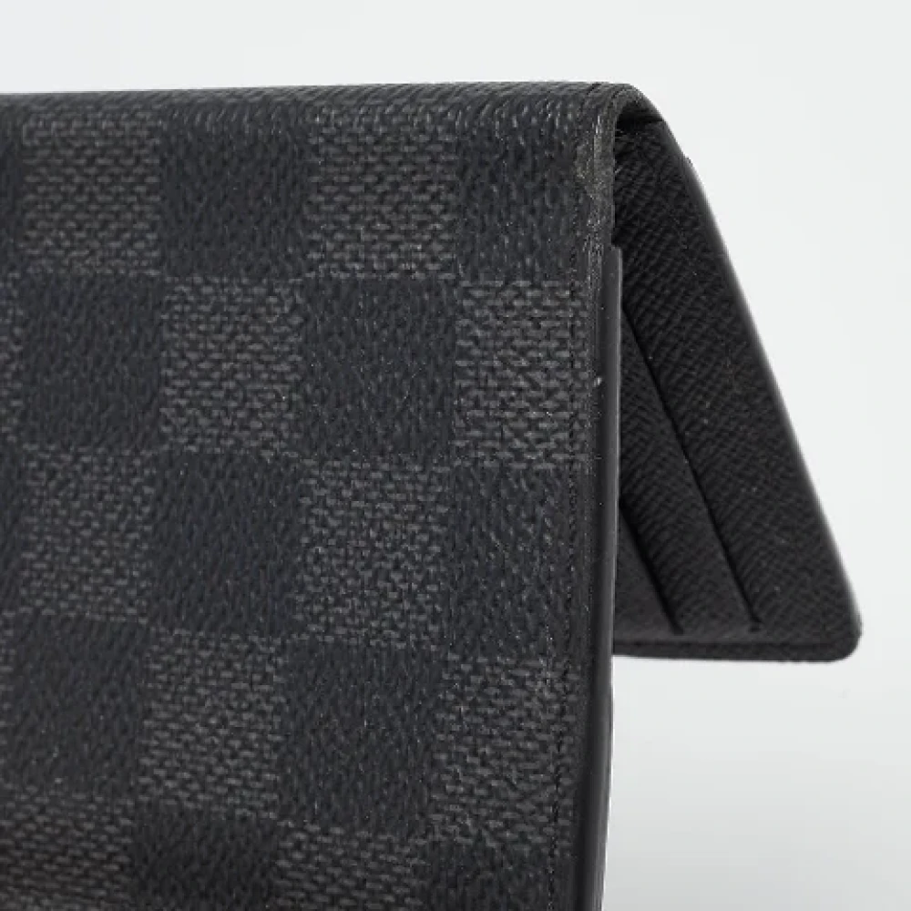 Louis Vuitton Vintage Pre-owned Coated canvas wallets Black Heren