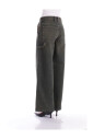 groene-jeans-met-rits-en-knoop