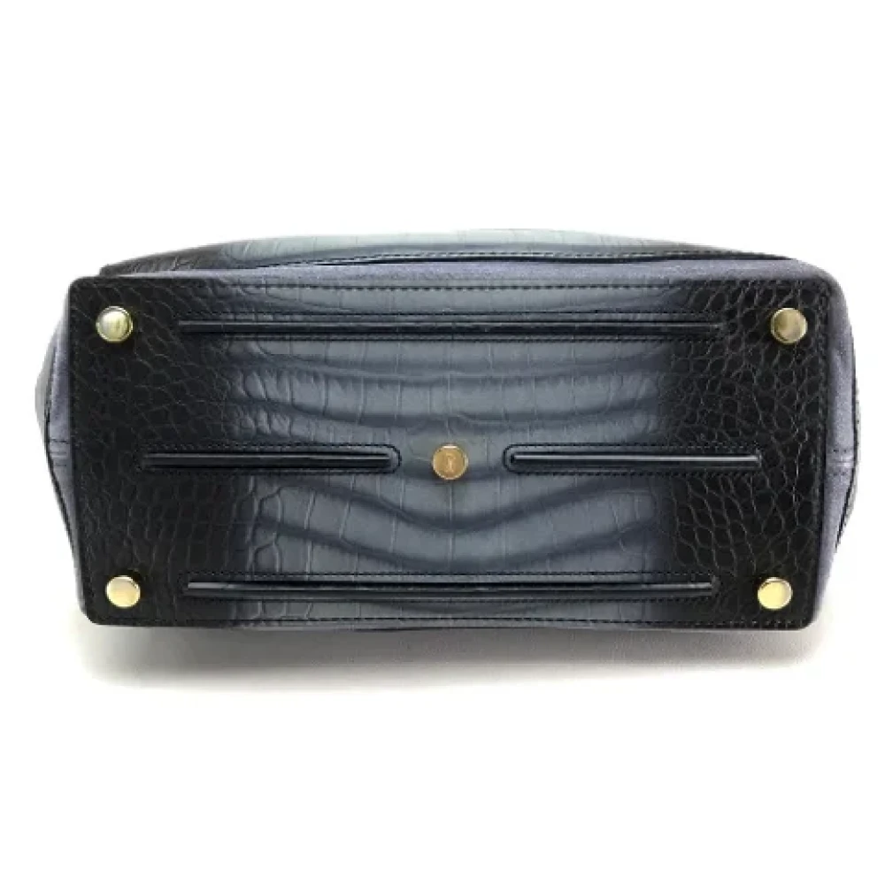 Yves Saint Laurent Vintage Pre-owned Canvas handbags Black Dames
