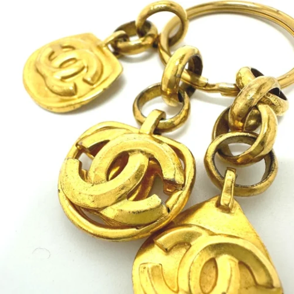 Chanel Vintage Pre-owned Metal key-holders Yellow Dames
