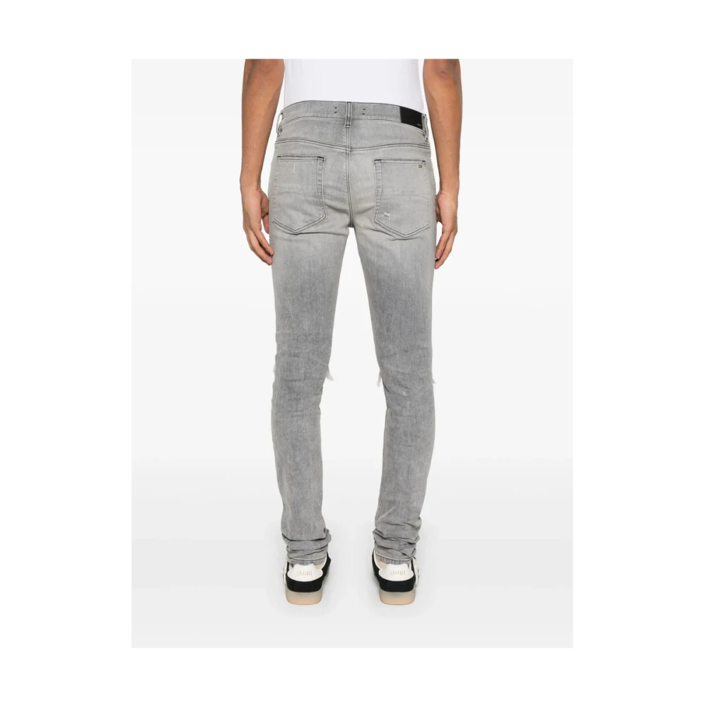 Amiri Lichtgrijze Ripped Jeans met Knoopsluiting Gray Heren