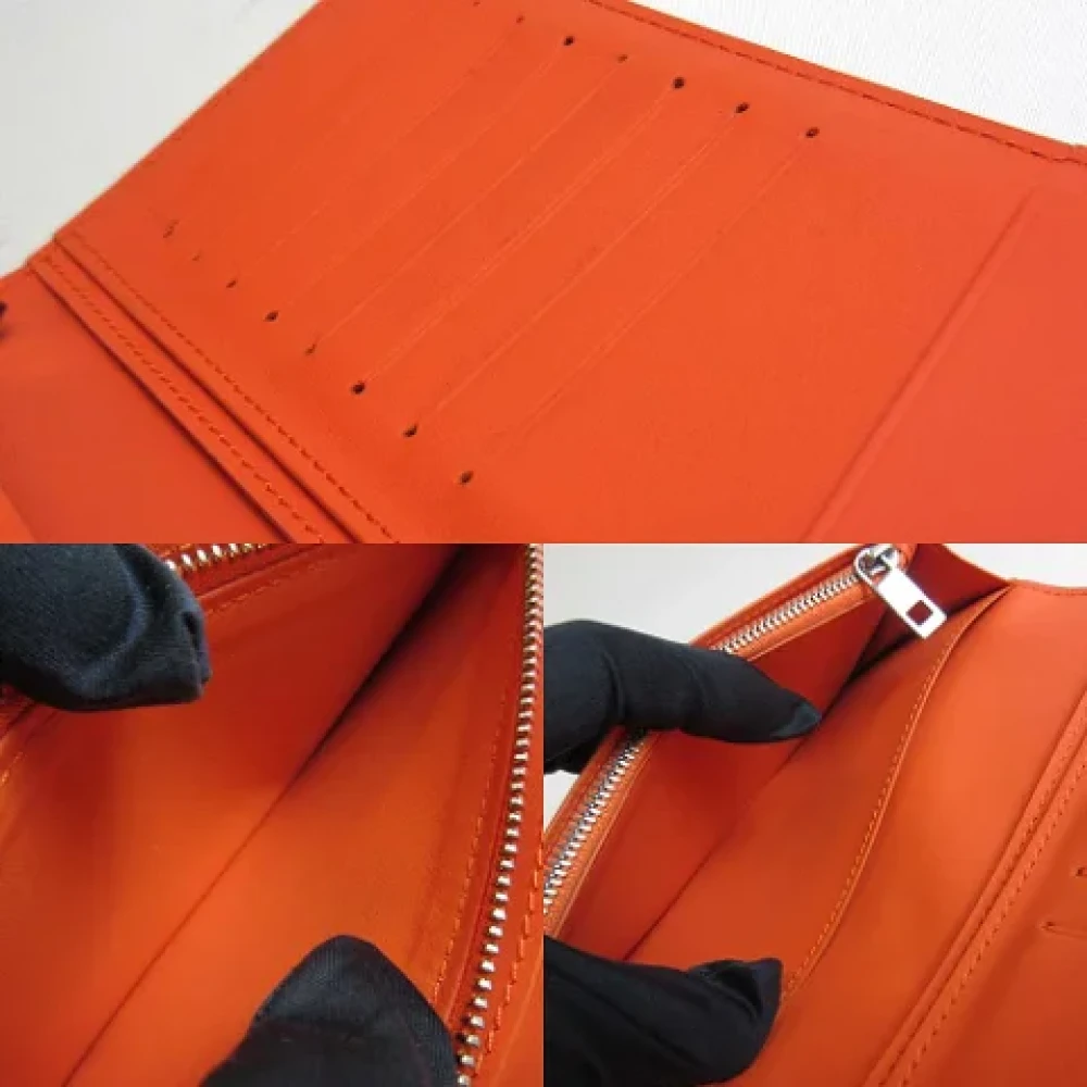 Louis Vuitton Vintage Pre-owned Canvas wallets Orange Heren