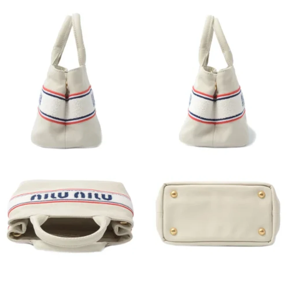 Miu Pre-owned Canvas handbags White Dames