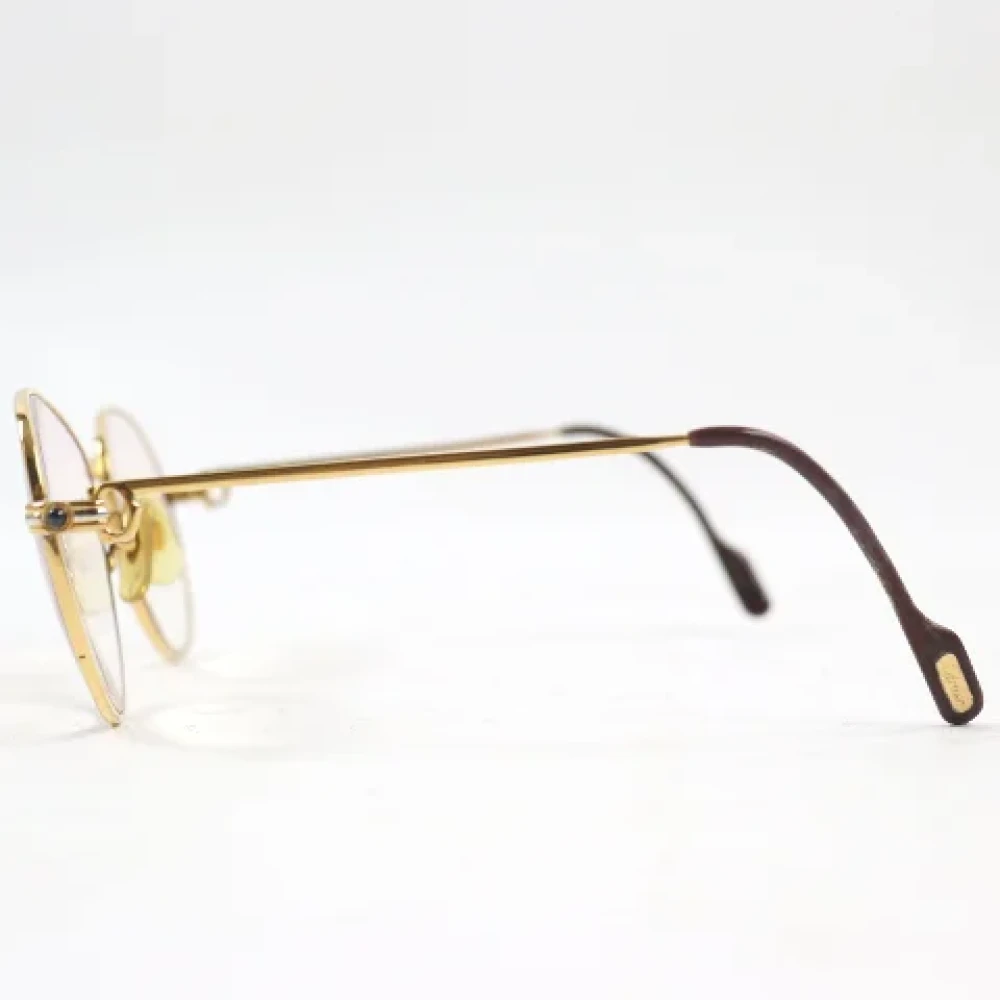 Cartier Vintage Pre-owned Metal sunglasses Yellow Dames