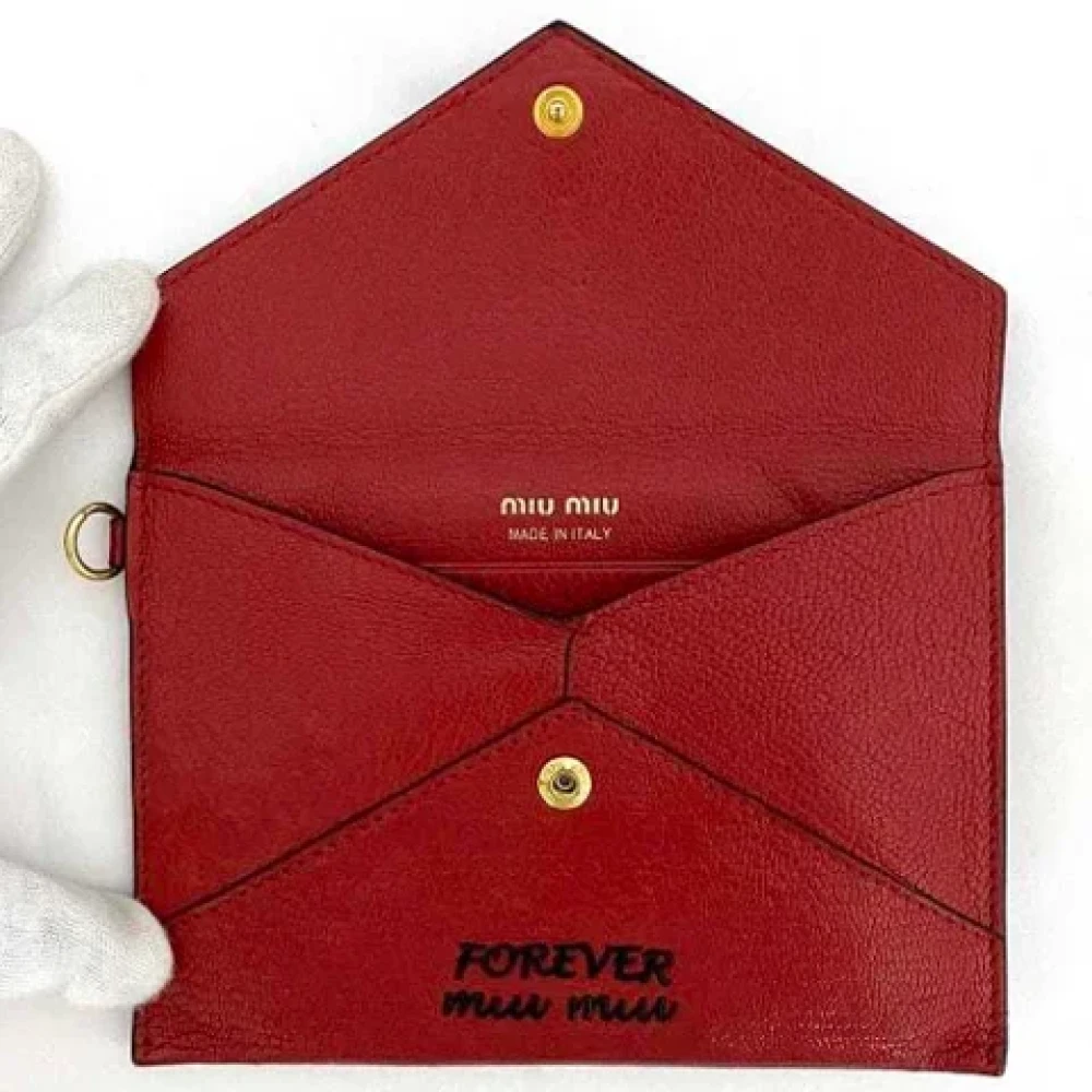 Miu Pre-owned Leather wallets Red Dames