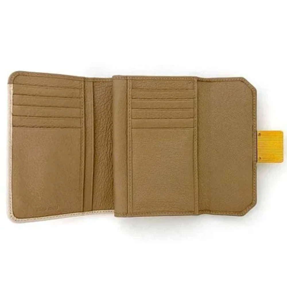 Miu Pre-owned Leather wallets Beige Dames
