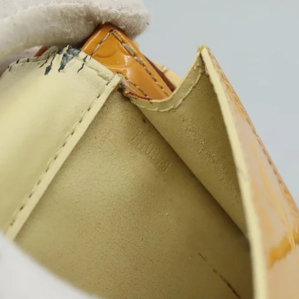 Louis Vuitton Vintage Pre-owned Leather pouches Yellow Dames