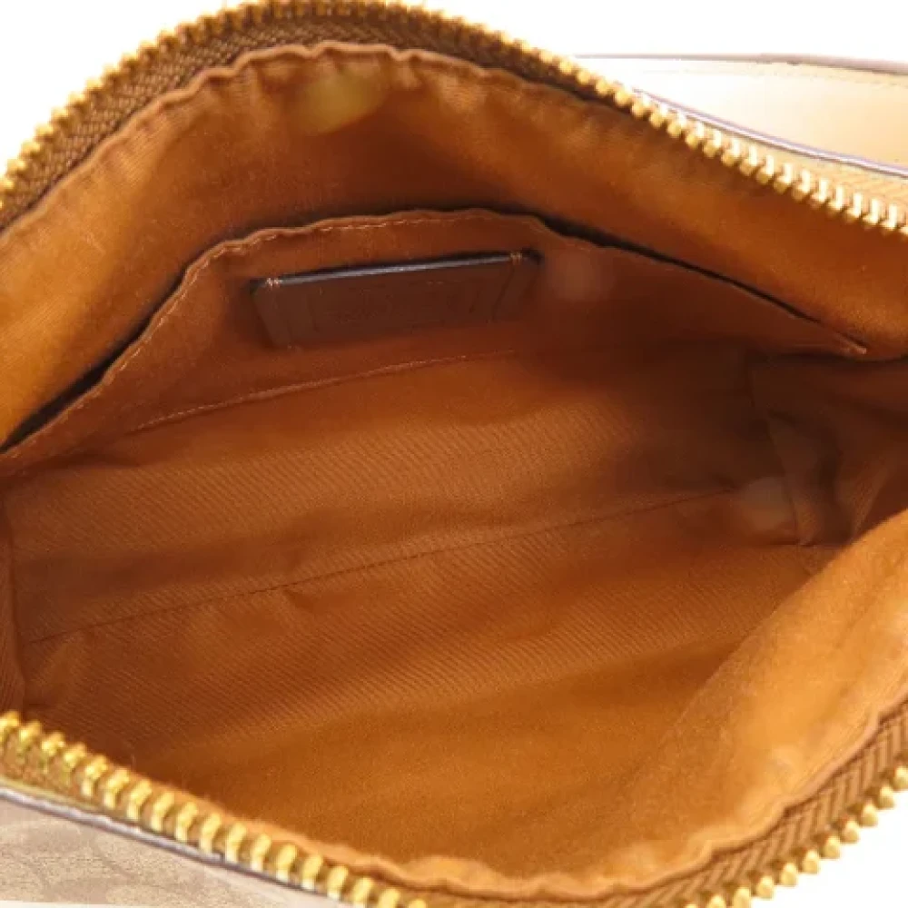 Coach Pre-owned Plastic shoulder-bags Brown Dames