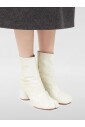 bottines-blanches-a-talon-sculpte