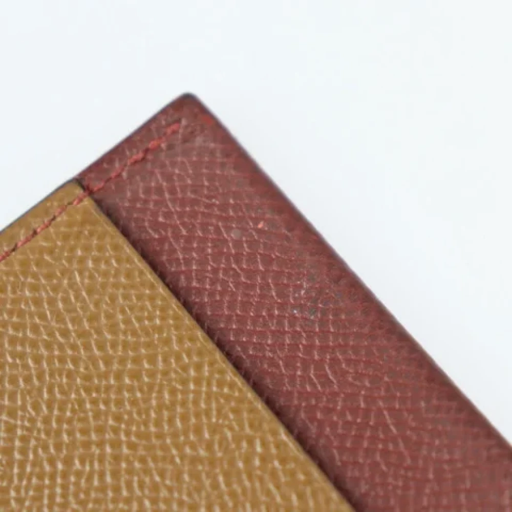 Hermès Vintage Pre-owned Leather wallets Brown Unisex
