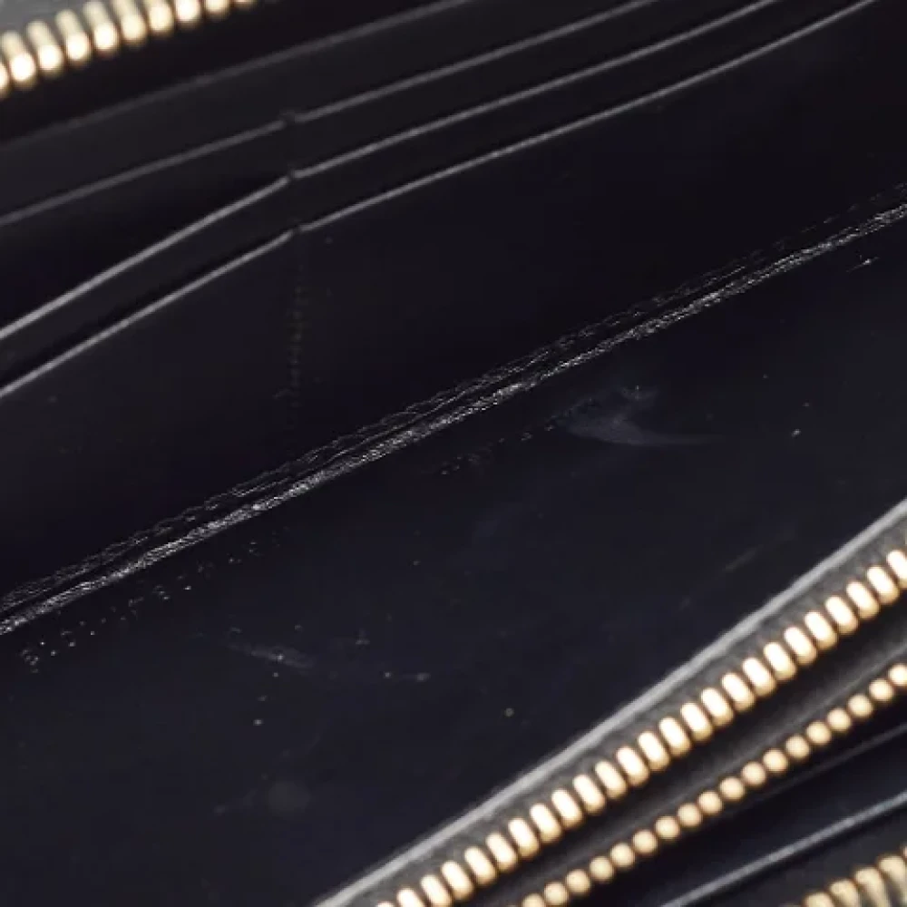 Yves Saint Laurent Vintage Pre-owned Leather wallets Black Dames