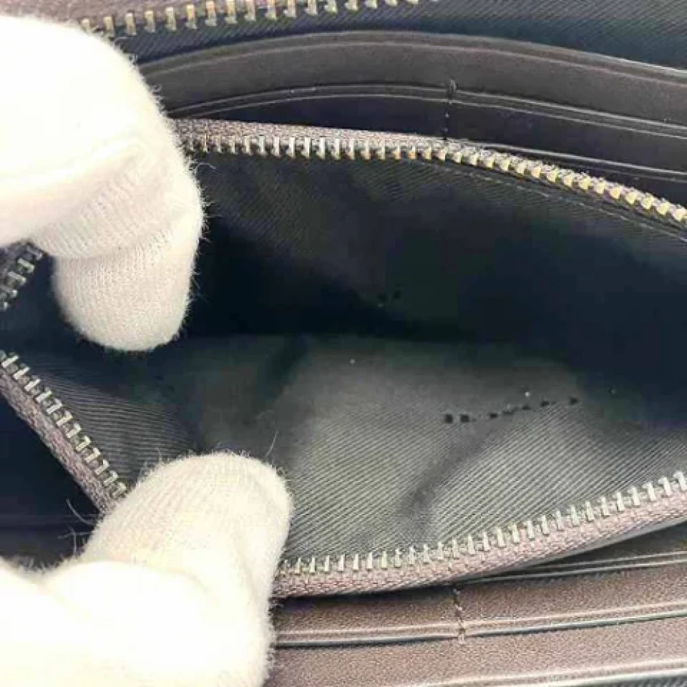 Coach Pre-owned Leather wallets Brown Dames