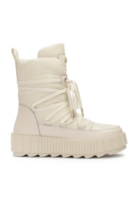 Modernt snö stövlar i beige färg
