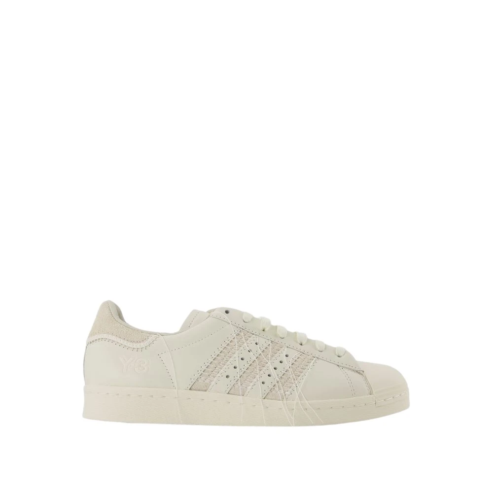 Elegante Off-White Skinn Sneakers