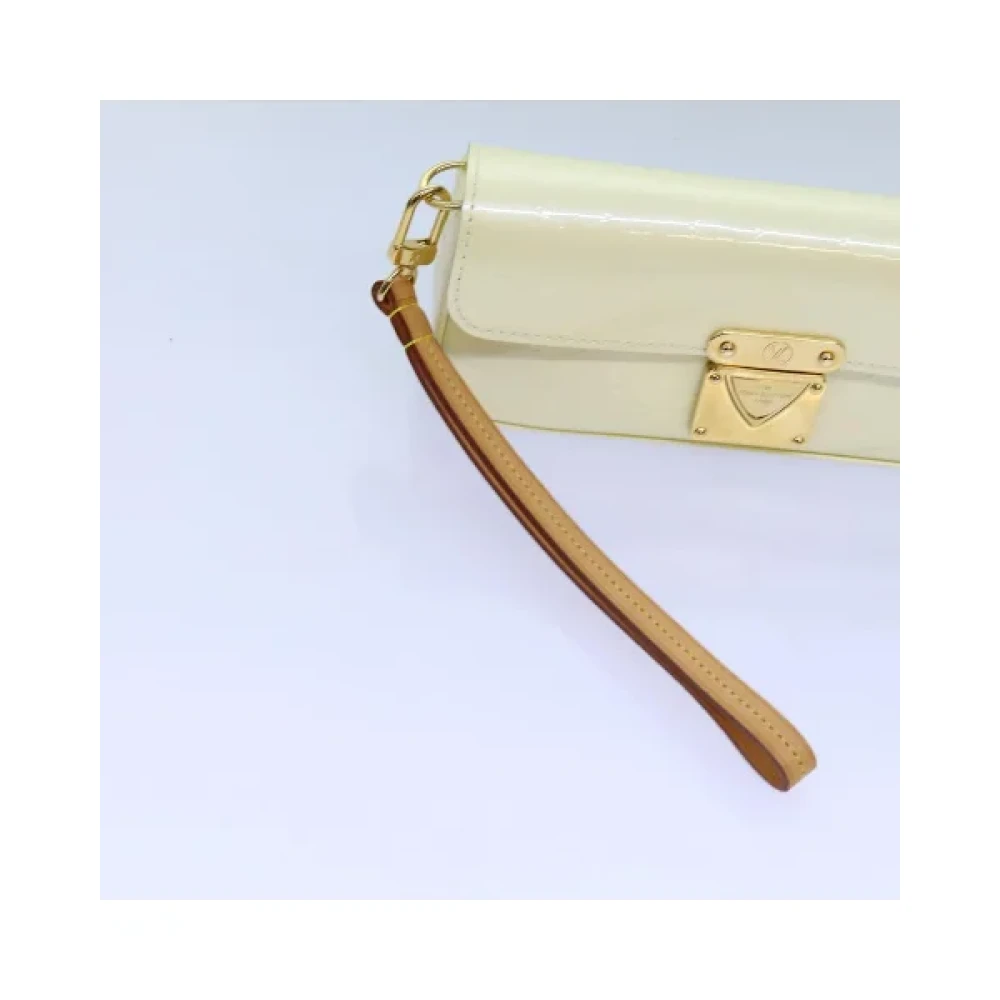 Louis Vuitton Vintage Pre-owned Leather clutches Yellow Dames