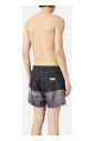 boxer-de-bain-a-motifs-avec-fond-noir-et-cordon-jaune