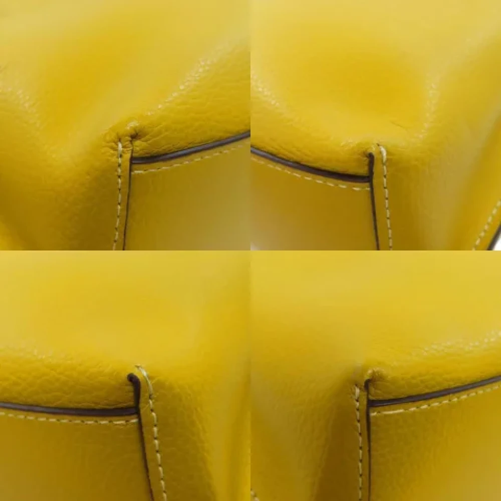 Coach Pre-owned Leather handbags Yellow Dames