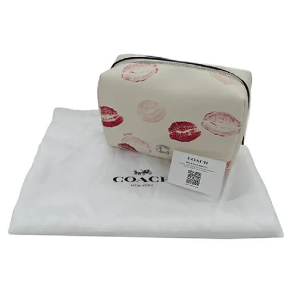 Coach Pre-owned Leather clutches Beige Dames
