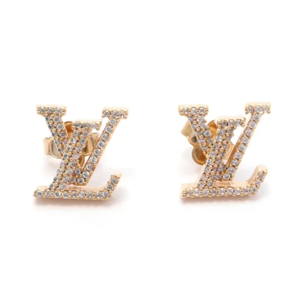 Louis Vuitton Vintage Pre-owned Metal earrings Beige Dames