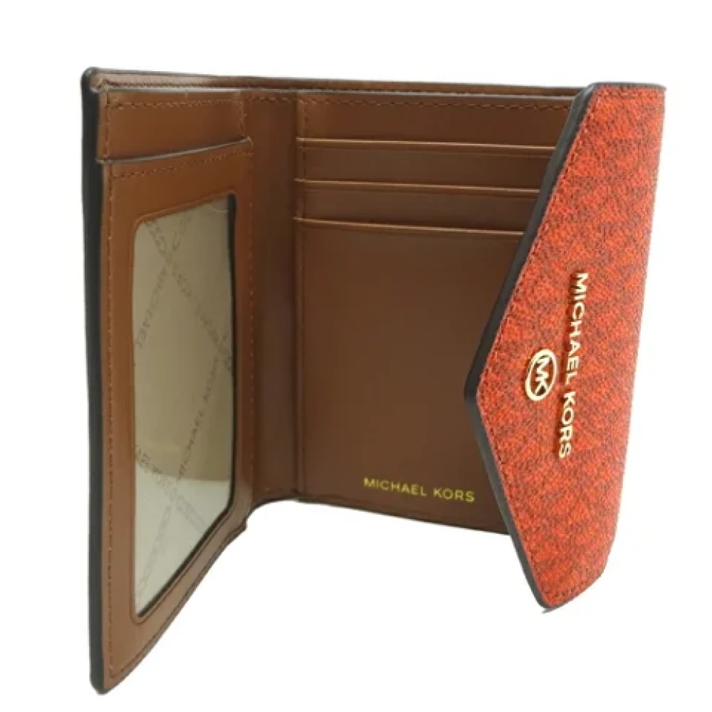 Michael Kors Pre-owned Canvas wallets Brown Dames