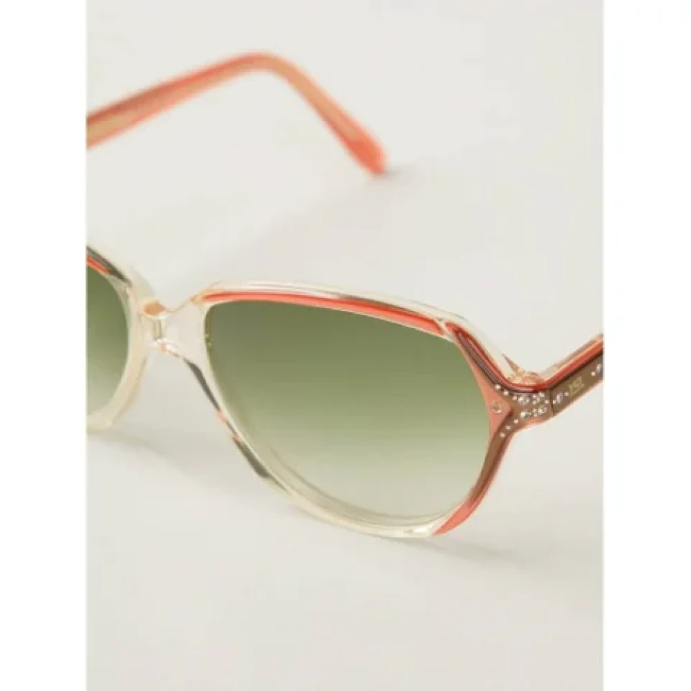 Yves Saint Laurent Vintage Pre-owned Acetate sunglasses Orange Dames