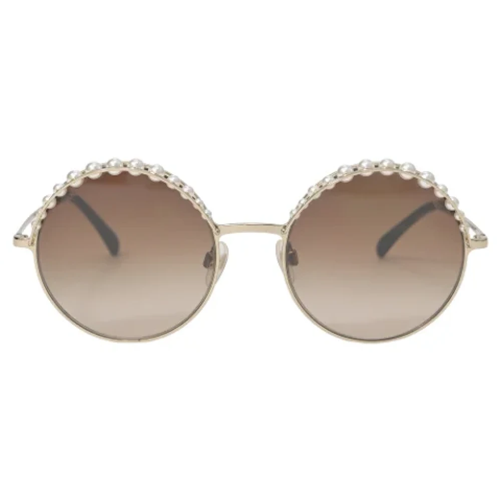 Chanel Vintage Pre-owned Metal sunglasses Yellow Dames