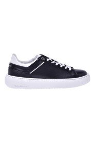 Black and white leather low-top trainers