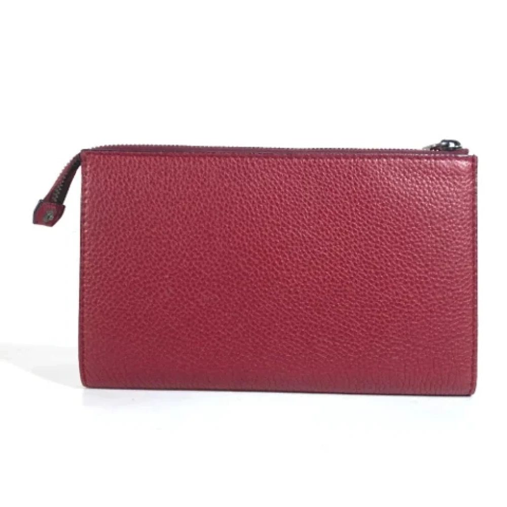 Salvatore Ferragamo Pre-owned Leather clutches Red Dames