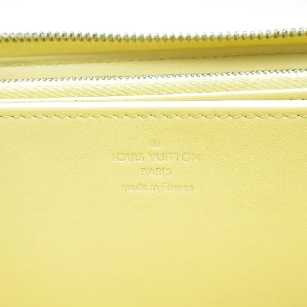 Louis Vuitton Vintage Pre-owned Leather wallets Yellow Dames