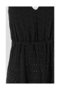 jumpsuit-met-blote-rug-en-rechte-broek